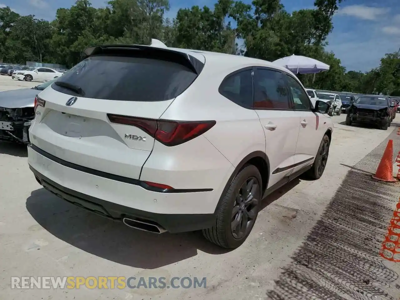 3 Photograph of a damaged car 5J8YE1H05PL042995 ACURA MDX 2023