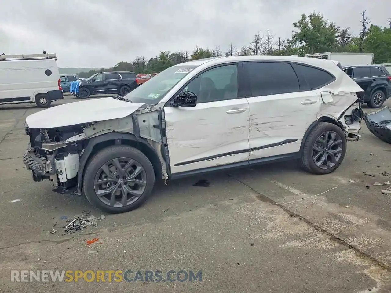 1 Photograph of a damaged car 5J8YE1H0XPL017574 ACURA MDX 2023