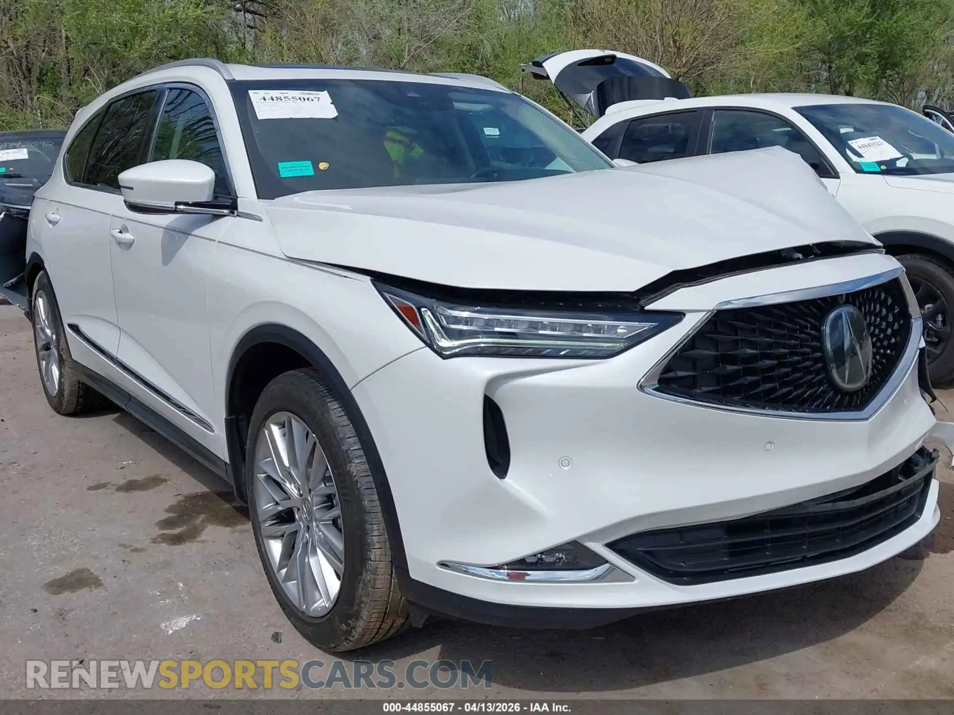 1 Photograph of a damaged car 5J8YE1H86RL002627 ACURA MDX 2024