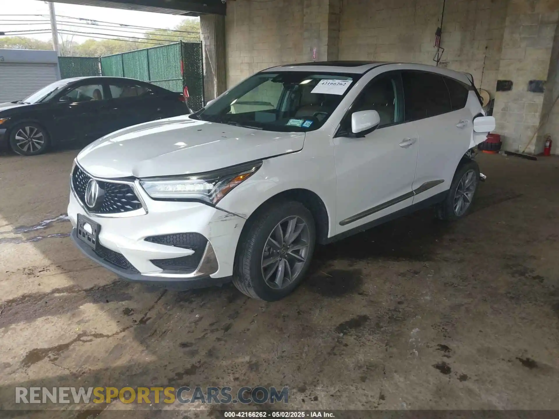 2 Photograph of a damaged car 5J8TC2H5XLL011379 ACURA RDX 2020