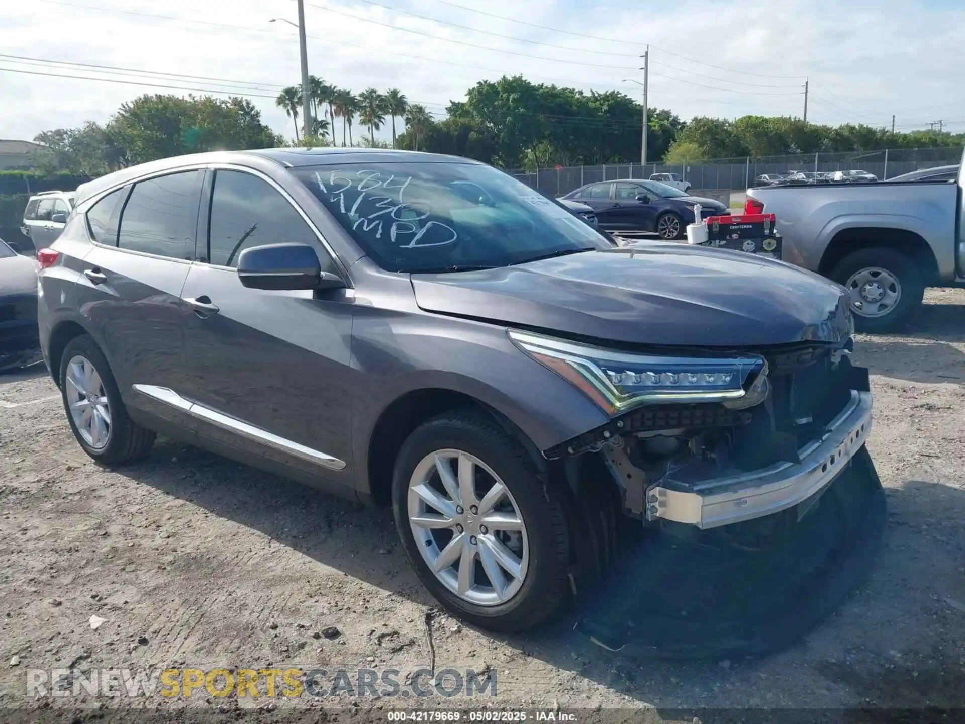 1 Photograph of a damaged car 5J8TC1H32ML001584 ACURA RDX 2021