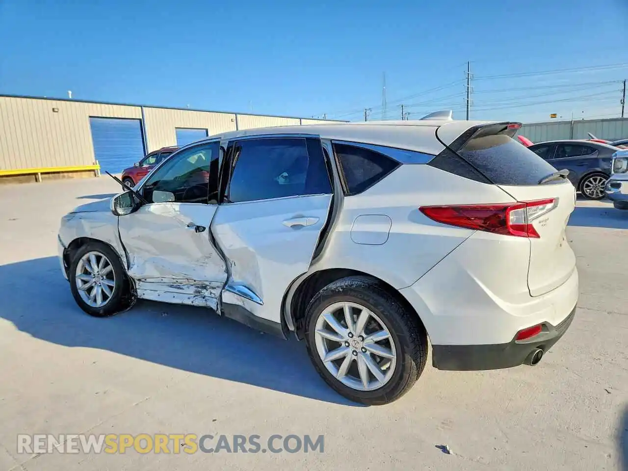 2 Photograph of a damaged car 5J8TC1H35ML001675 ACURA RDX 2021