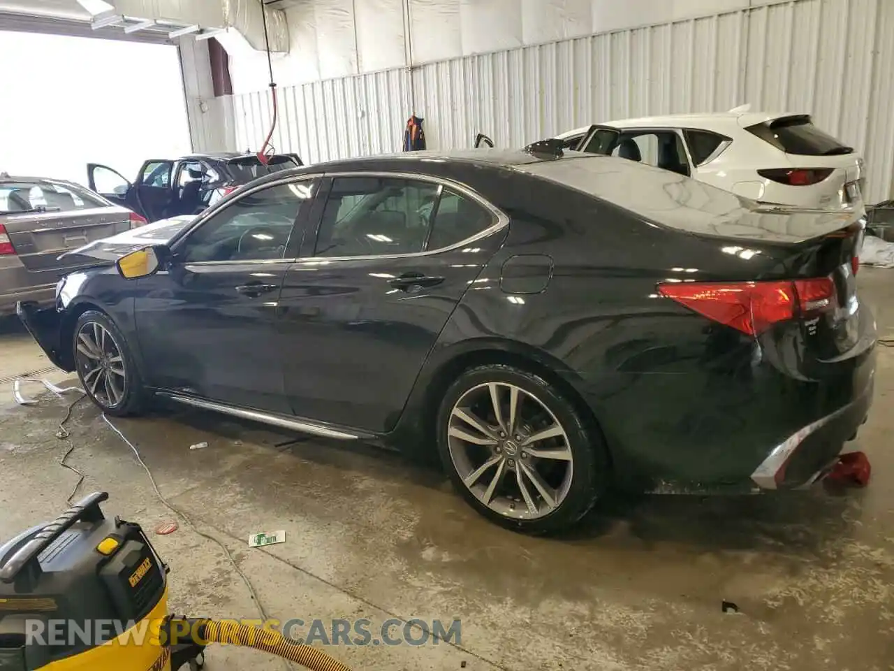 2 Photograph of a damaged car 19UUB2F46KA007423 ACURA TLX 2019