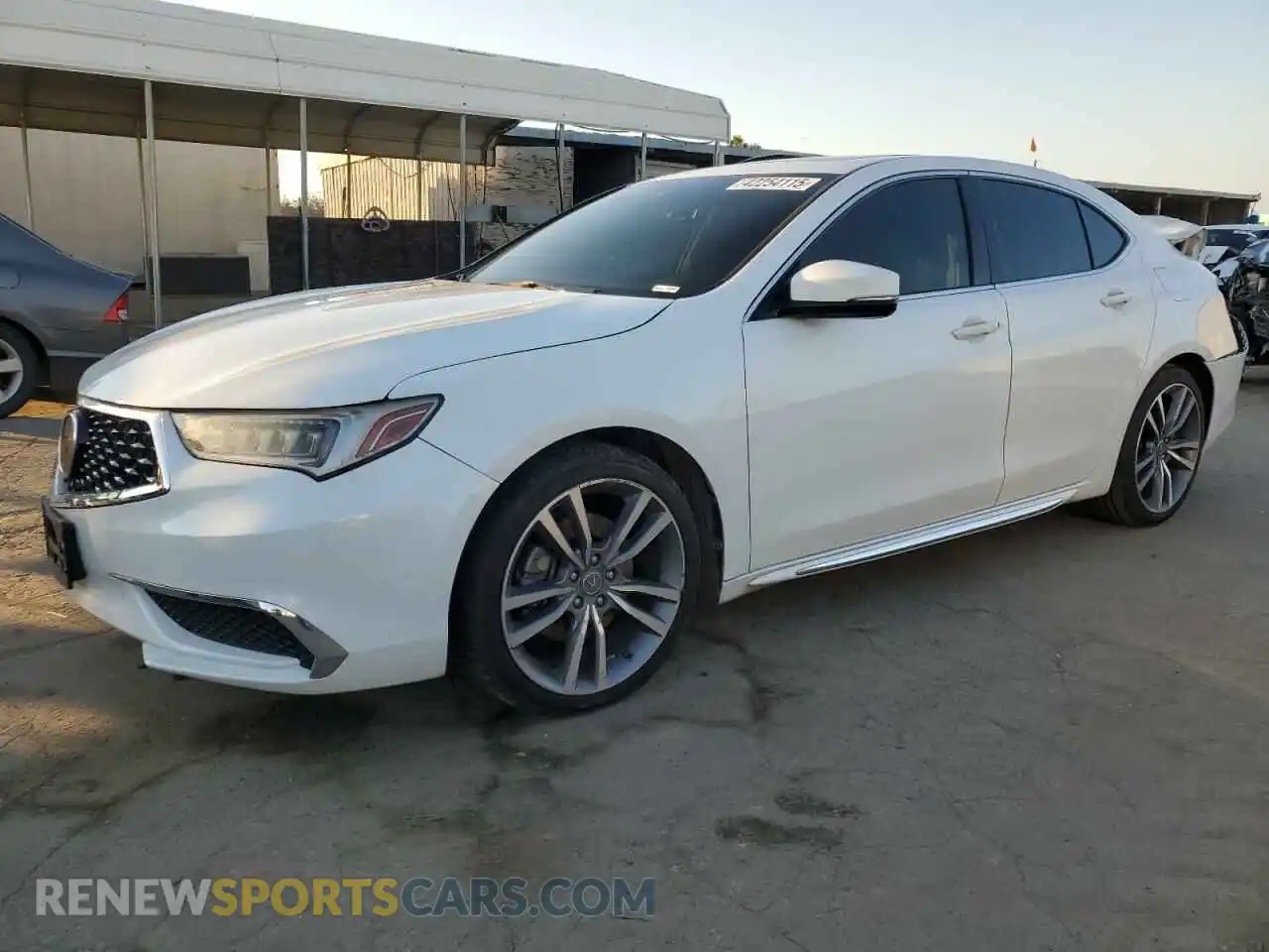 1 Photograph of a damaged car 19UUB2F48KA007732 ACURA TLX 2019