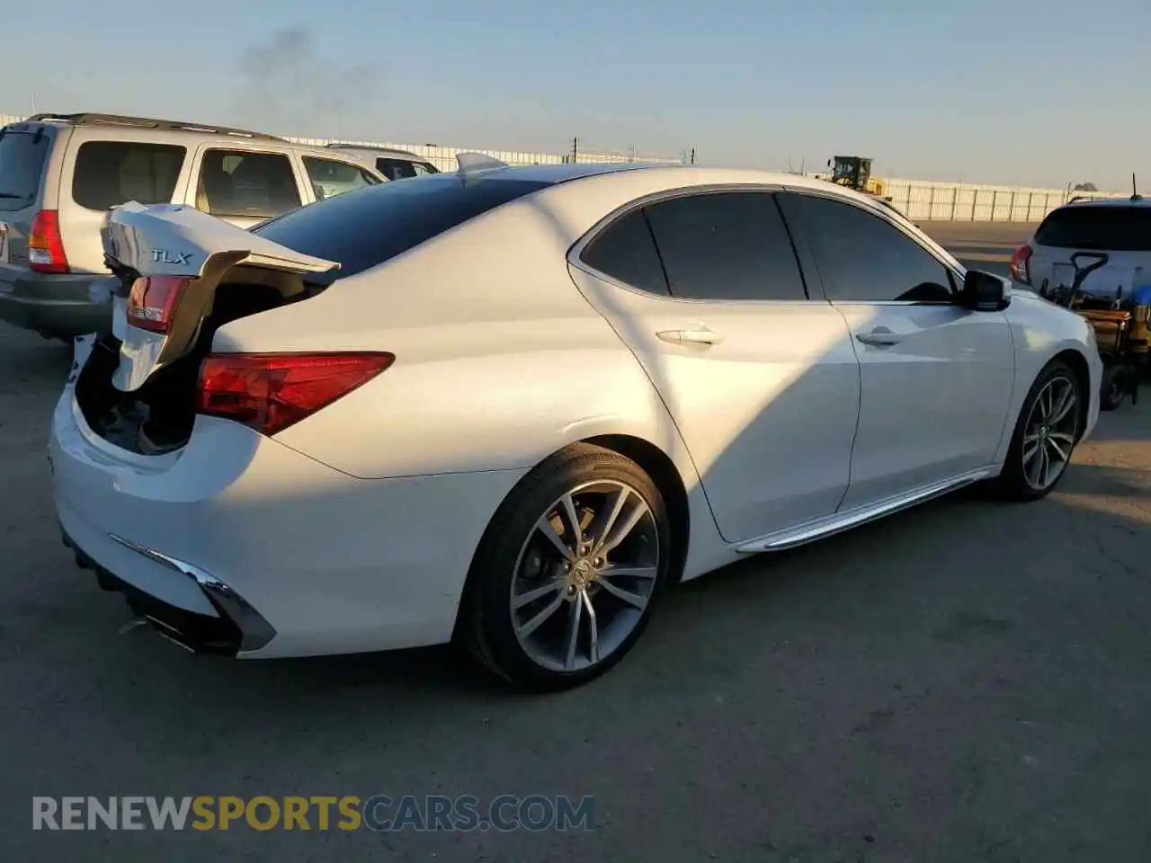 3 Photograph of a damaged car 19UUB2F48KA007732 ACURA TLX 2019