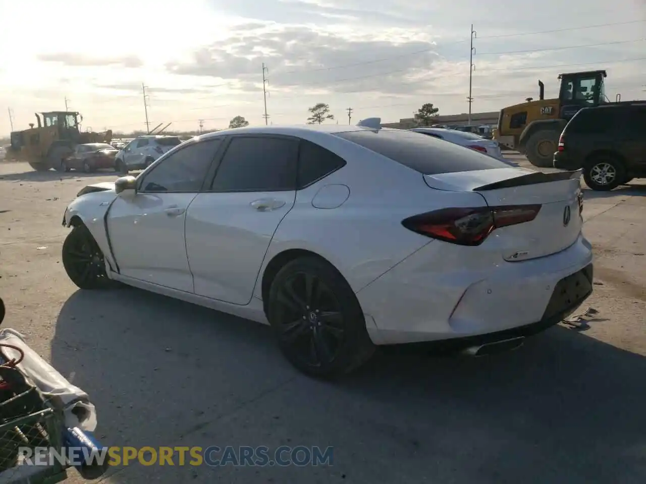 2 fotografías del automóvil dañado 19UUB5F59MA003377 ACURA TLX 2021