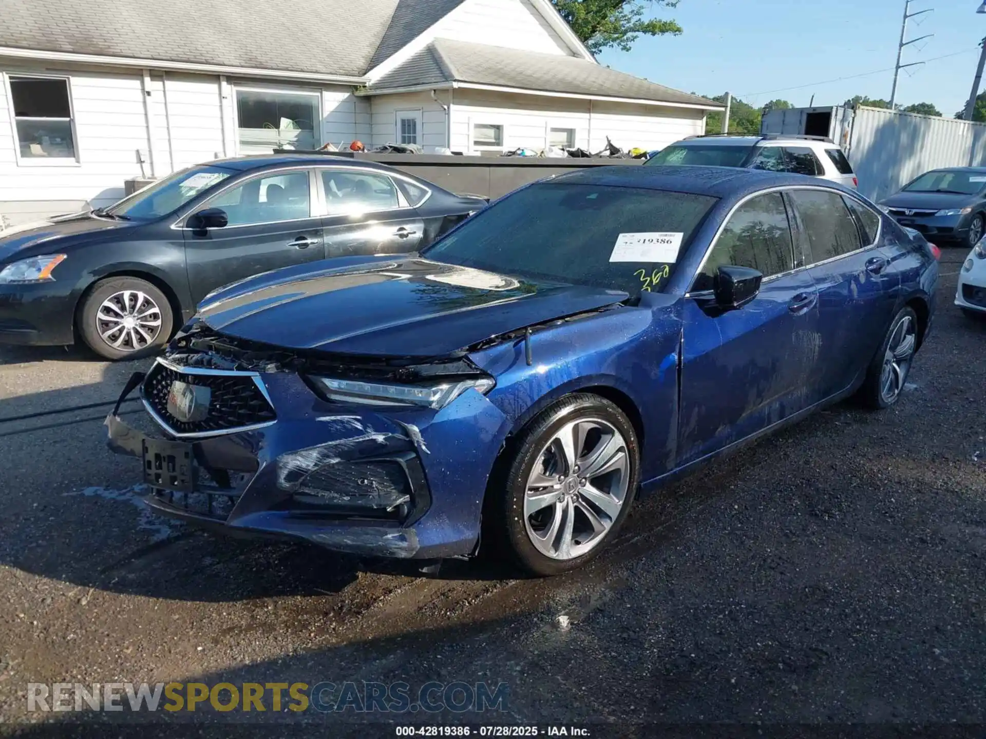 2 Photograph of a damaged car 19UUB5F60MA010663 ACURA TLX 2021