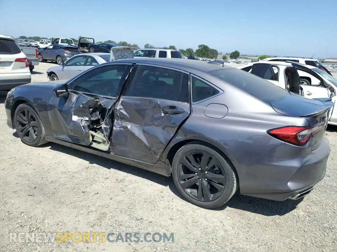 2 Photograph of a damaged car 19UUB6F49MA001383 ACURA TLX 2021