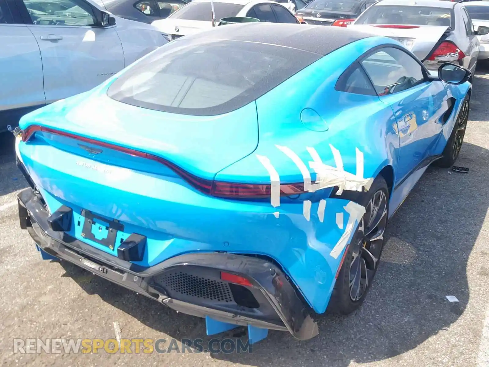 2 fotografías del automóvil dañado SCFSMGAW1KGN00334 ASTON MARTIN ALL MODELS 2019