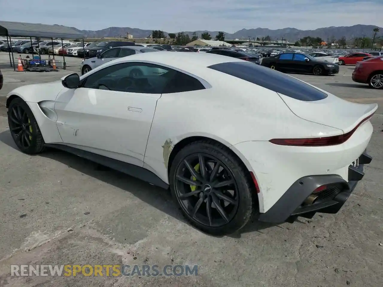 2 fotografías del automóvil dañado SCFSMGAW2KGN01086 ASTON MARTIN ALL MODELS 2019