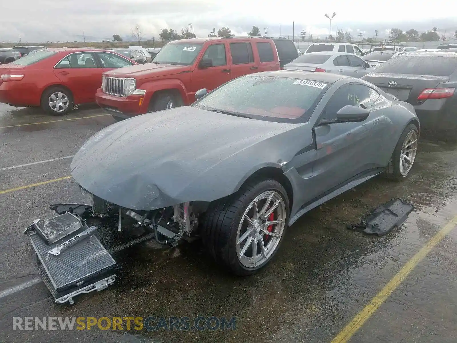 2 fotografías del automóvil dañado SCFSMGAW2KGN01475 ASTON MARTIN ALL MODELS 2019