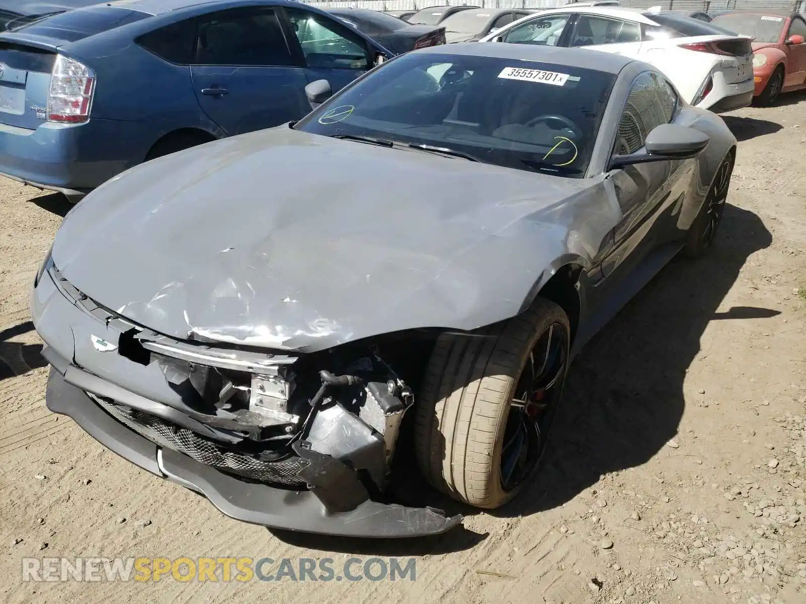 2 fotografías del automóvil dañado SCFSMGAW4KGN01316 ASTON MARTIN ALL MODELS 2019