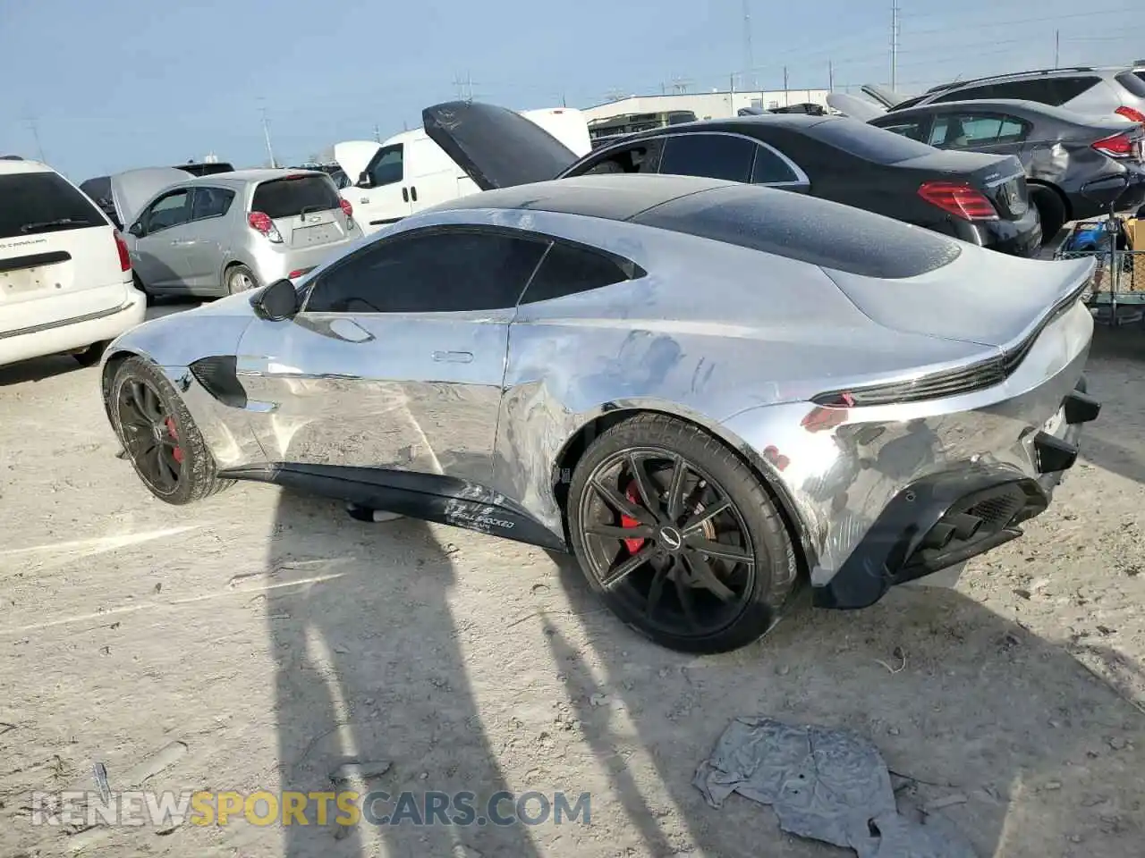 2 fotografías del automóvil dañado SCFSMGAW1LGN03414 ASTON MARTIN ALL MODELS 2020