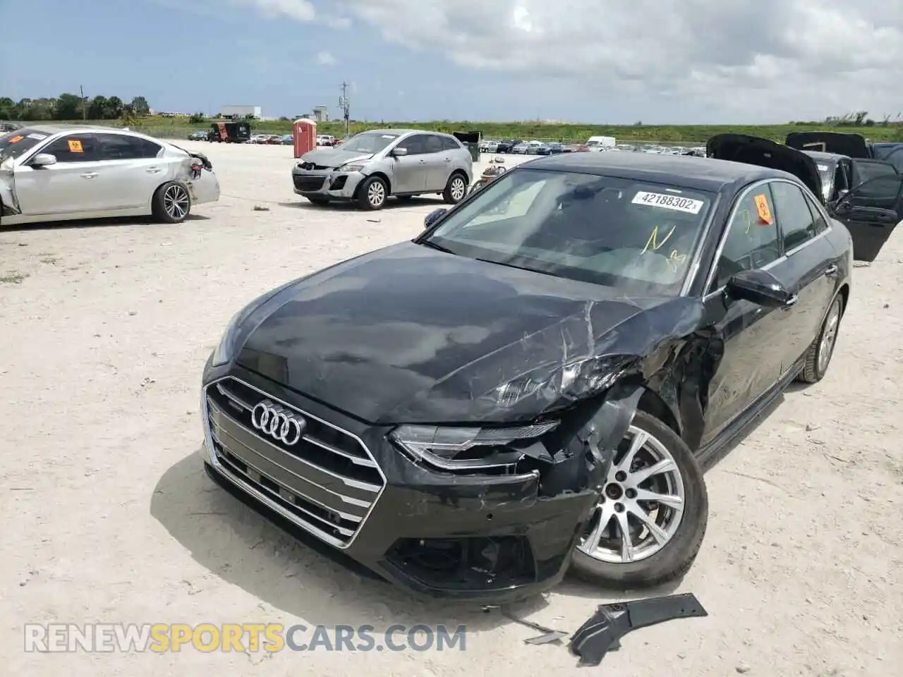 2 fotografías del automóvil dañado WAUABAF43NA004623 AUDI A4 2022