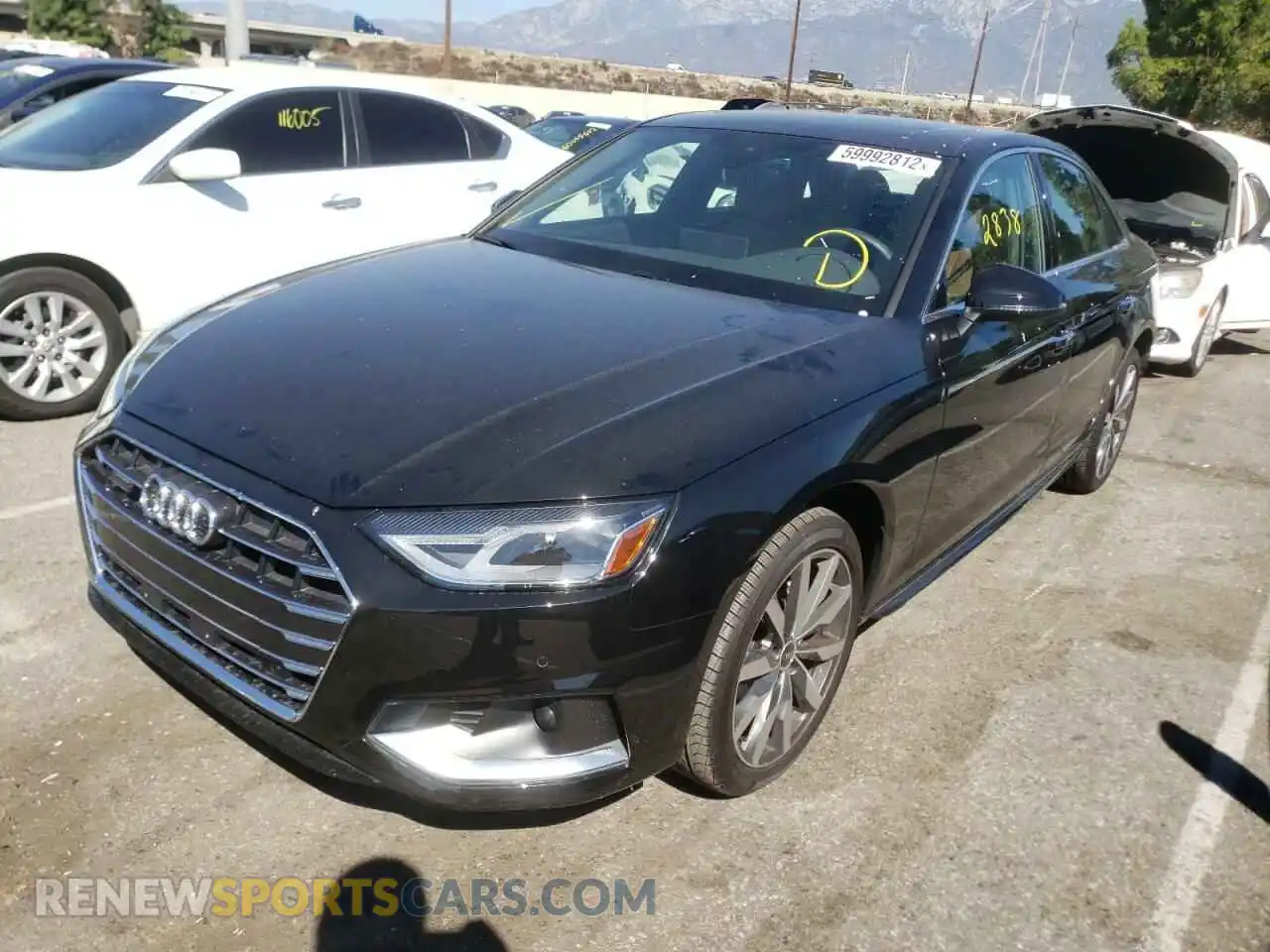 2 fotografías del automóvil dañado WAUABAF47NN003399 AUDI A4 2022
