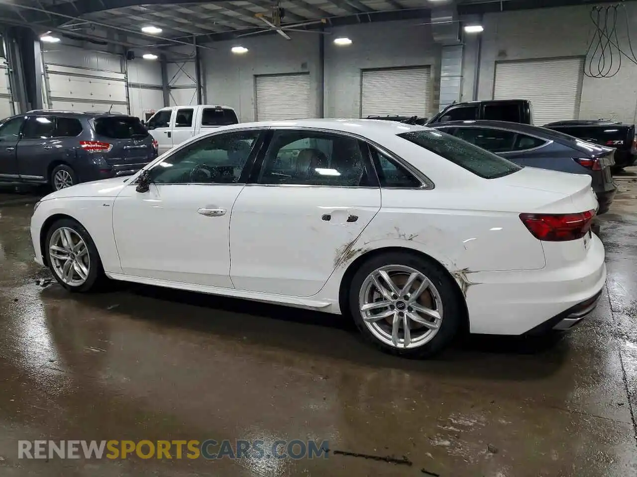 2 fotografías del automóvil dañado WAUEAAF42PN009490 AUDI A4 2023