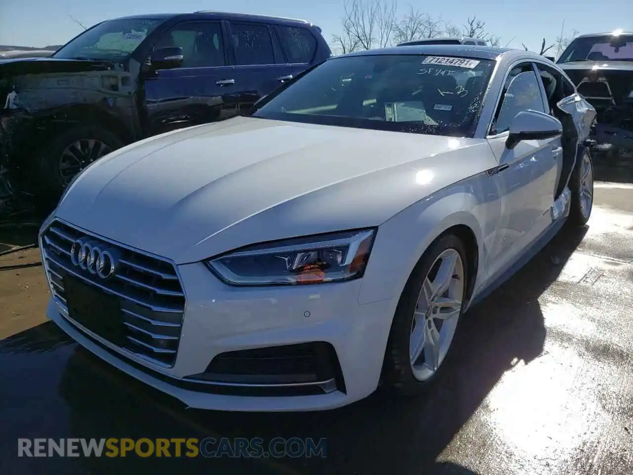 2 Photograph of a damaged car WAUENCF53KA023603 AUDI A5 2019