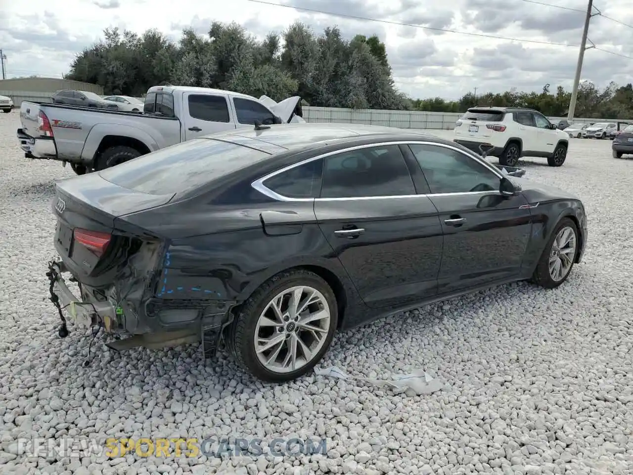 3 Photograph of a damaged car WAUCBCF53PA056642 AUDI A5 2023
