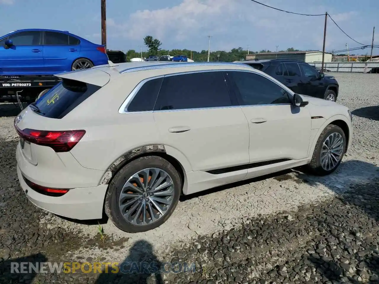 3 Photograph of a damaged car WA1VAAGE8KB015048 AUDI E-TRON 2019