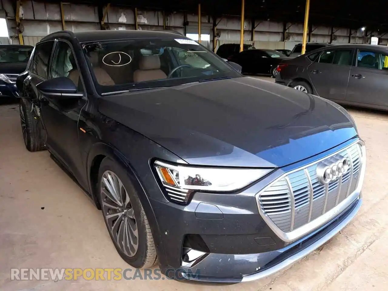 1 Photograph of a damaged car WA1VABGE1KB013261 AUDI E-TRON 2019
