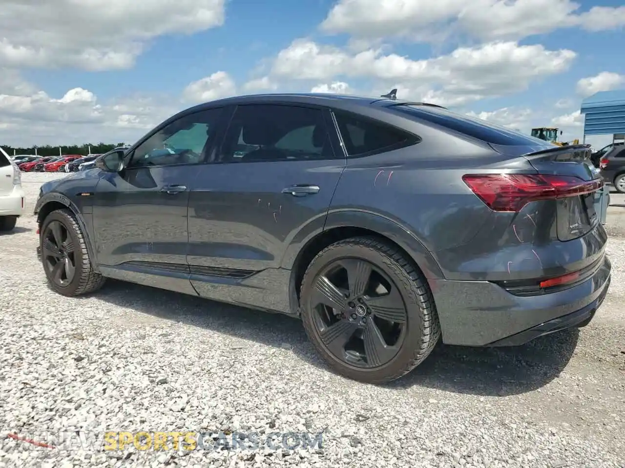 2 fotografías del automóvil dañado WA12AAGE1MB039861 AUDI E-TRON 2021