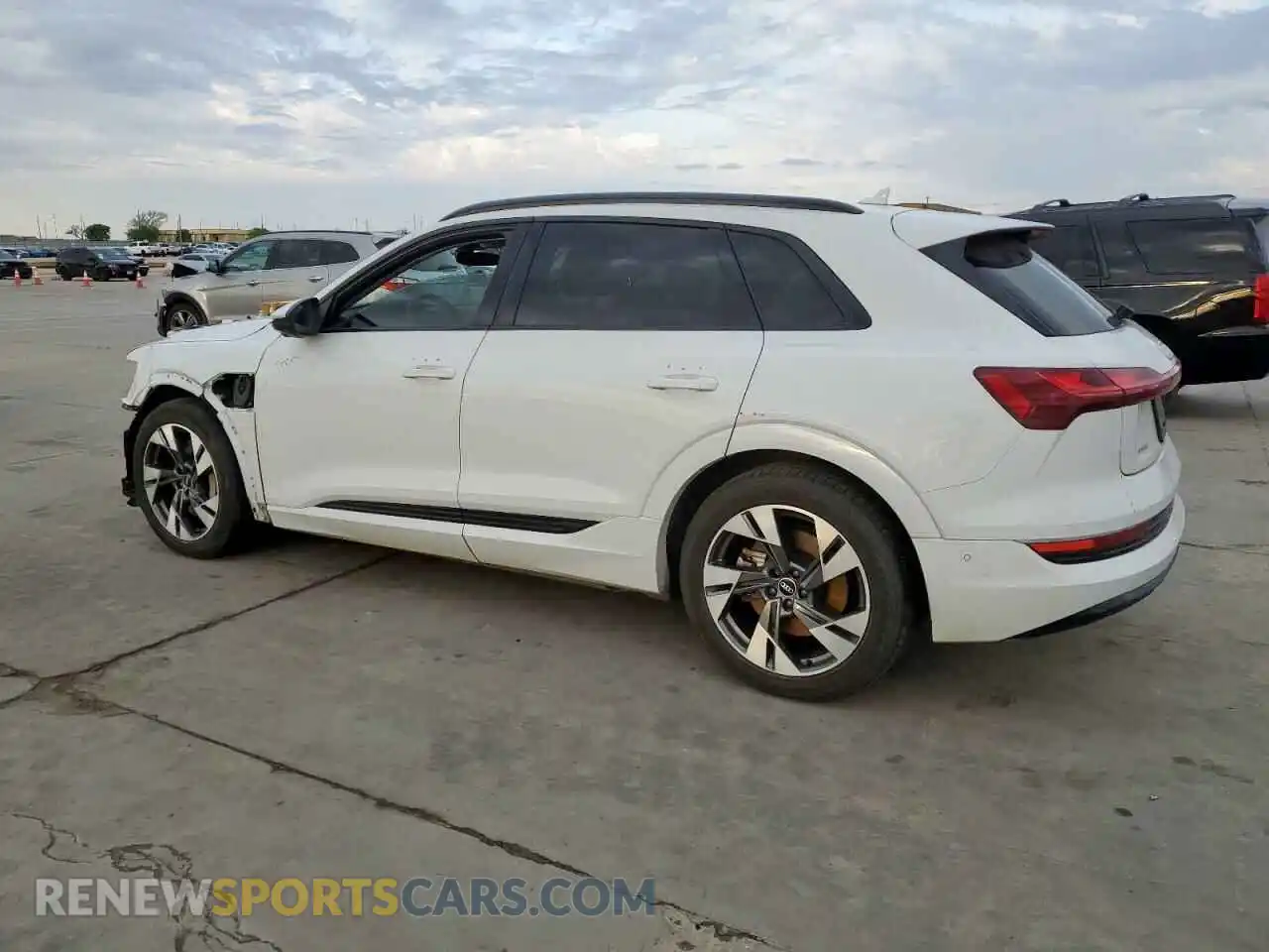 2 Photograph of a damaged car WA1AAAGE7MB023949 AUDI E-TRON 2021