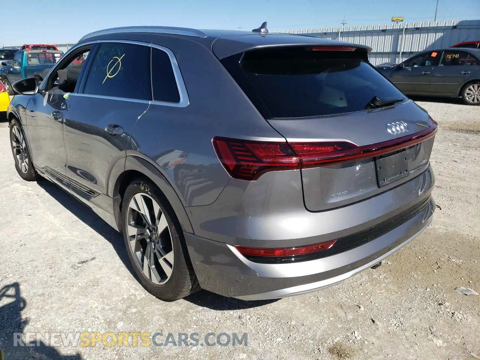 3 Photograph of a damaged car WA1AAAGE9MB014833 AUDI E-TRON 2021
