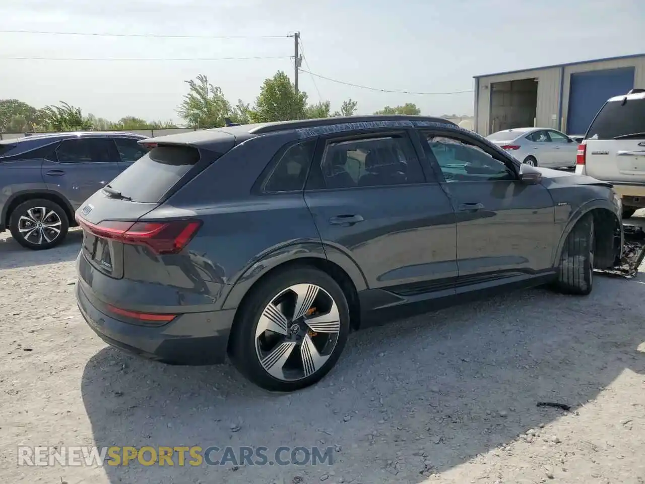 3 Photograph of a damaged car WA1LAAGE6NB010328 AUDI E-TRON 2022