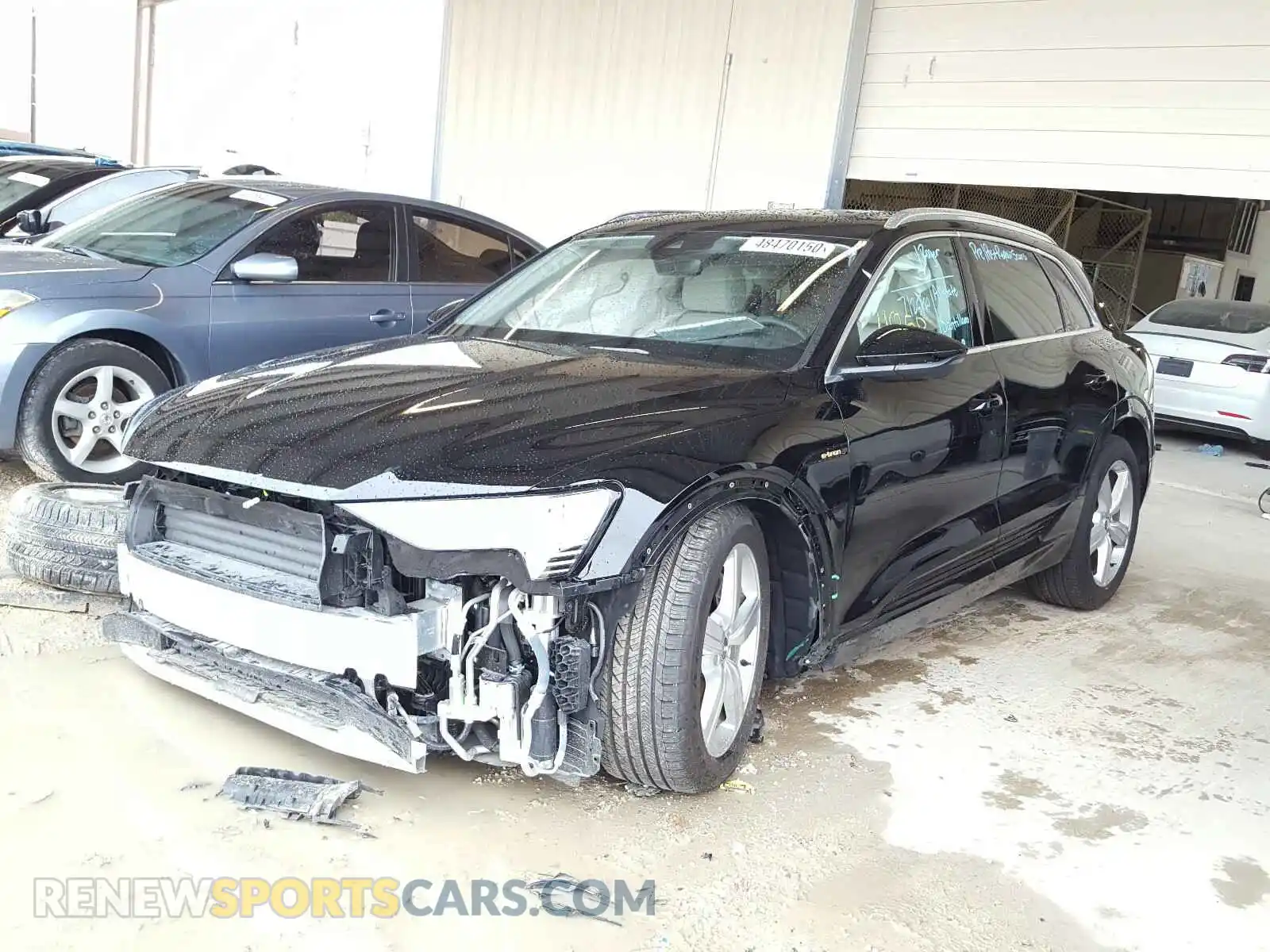 2 Photograph of a damaged car WA1LAAGE8KB009032 AUDI E-TRON PRE 2019