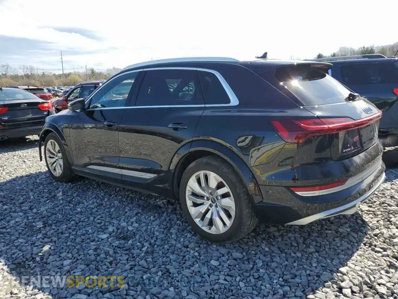 2 Photograph of a damaged car WA1ACBGE0NB038956 AUDI E-TRON S P 2022