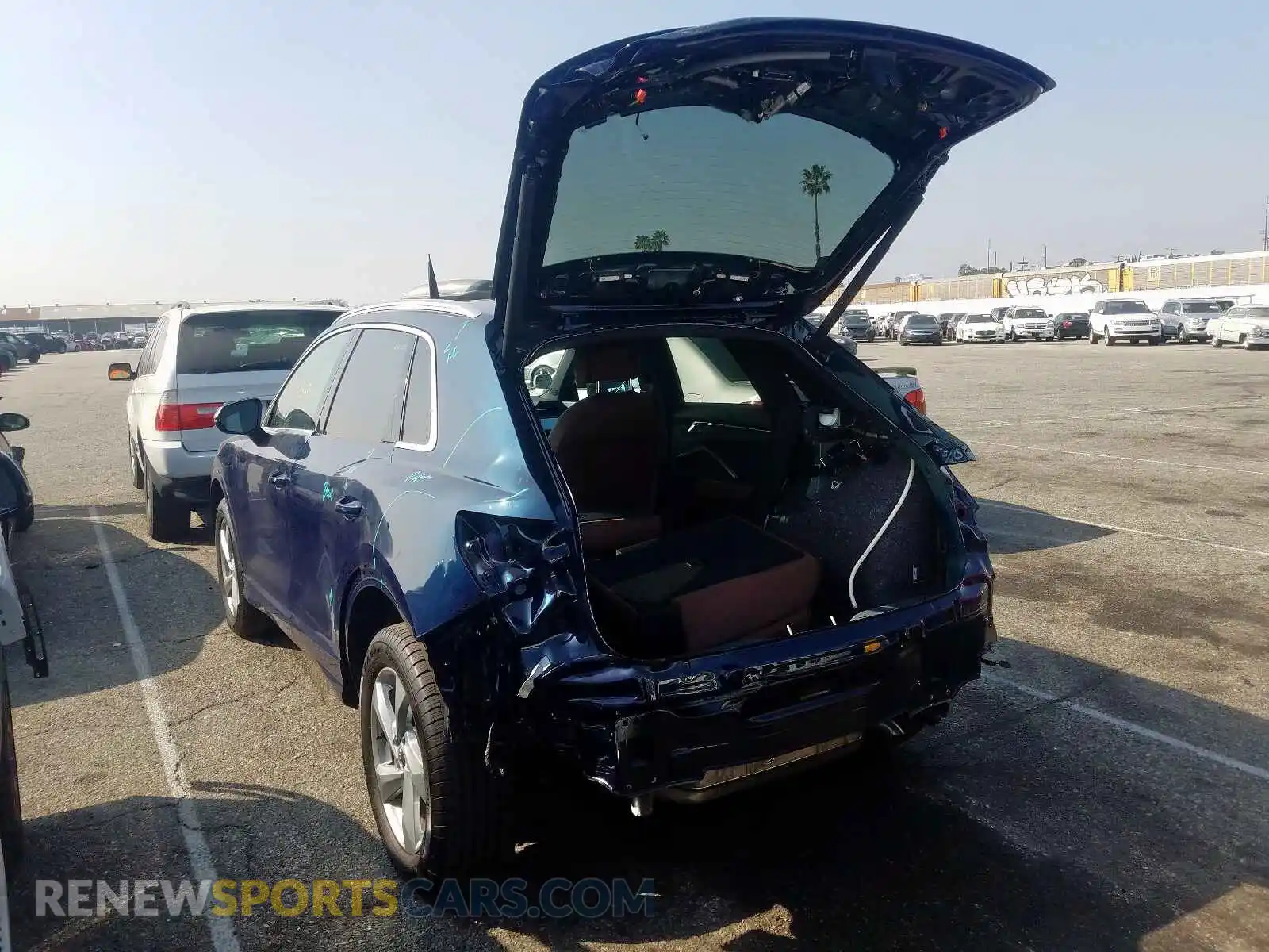 3 Photograph of a damaged car WA1AECF38K1080034 AUDI Q3 2019