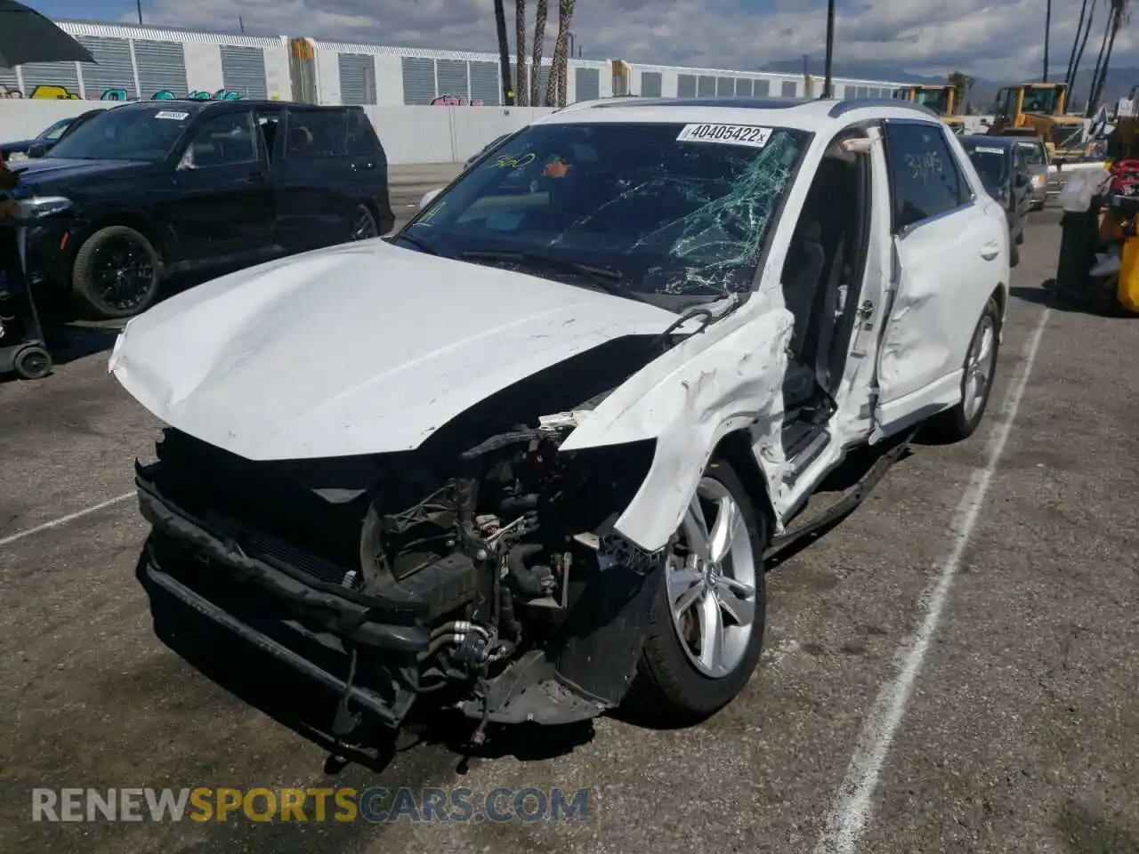 2 fotografías del automóvil dañado WA1EECF38K1071450 AUDI Q3 2019