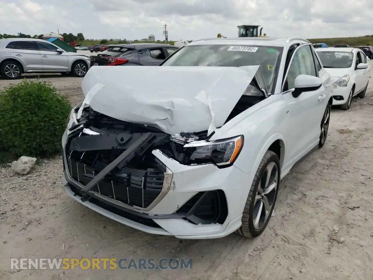 2 fotografías del automóvil dañado WA1DECF39M1153136 AUDI Q3 2021