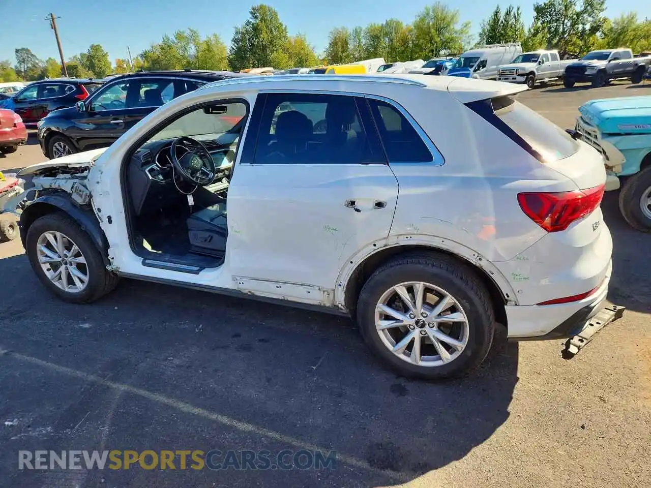 2 fotografías del automóvil dañado WA1EECF35M1048095 AUDI Q3 2021