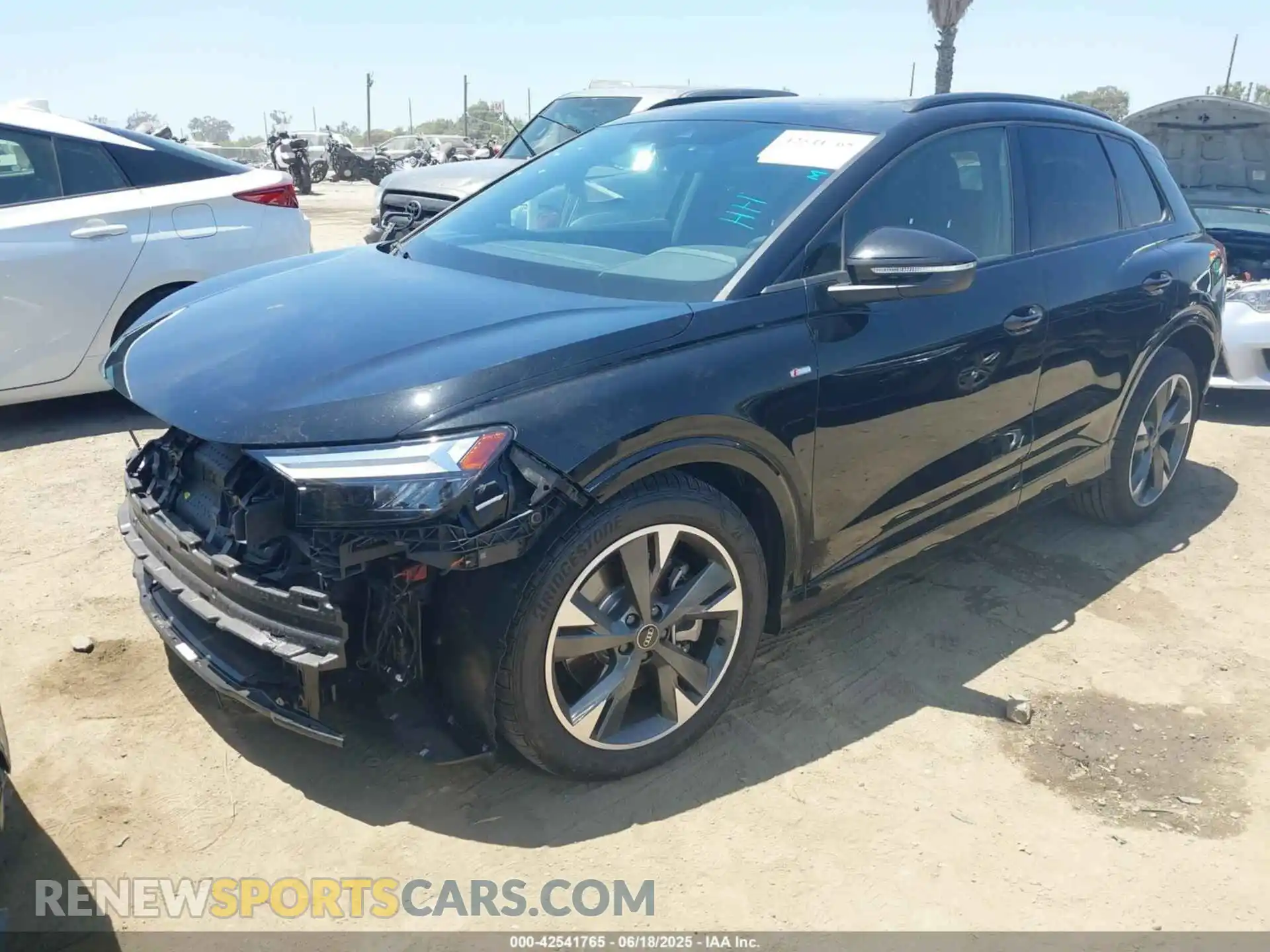 2 Photograph of a damaged car WA1KUBFZXRP059537 AUDI Q4 E-TRON 2024