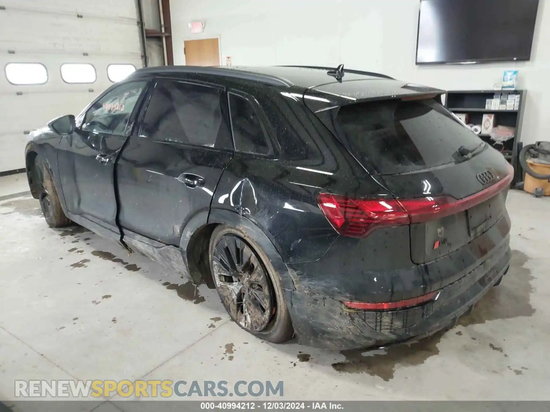 3 Photograph of a damaged car WA16AAGE0RB017987 AUDI Q8 E-TRON 2024