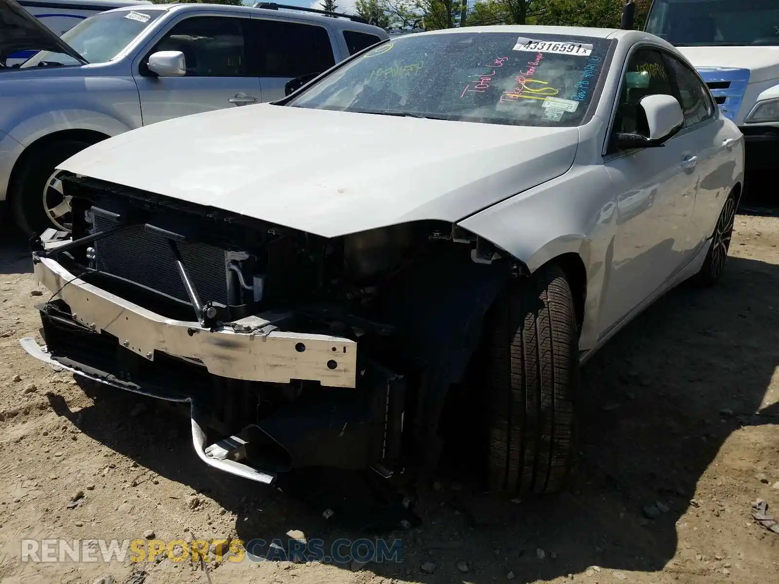 2 Photograph of a damaged car WBA73AK05L7F64702 BMW 2 SERIES 2020