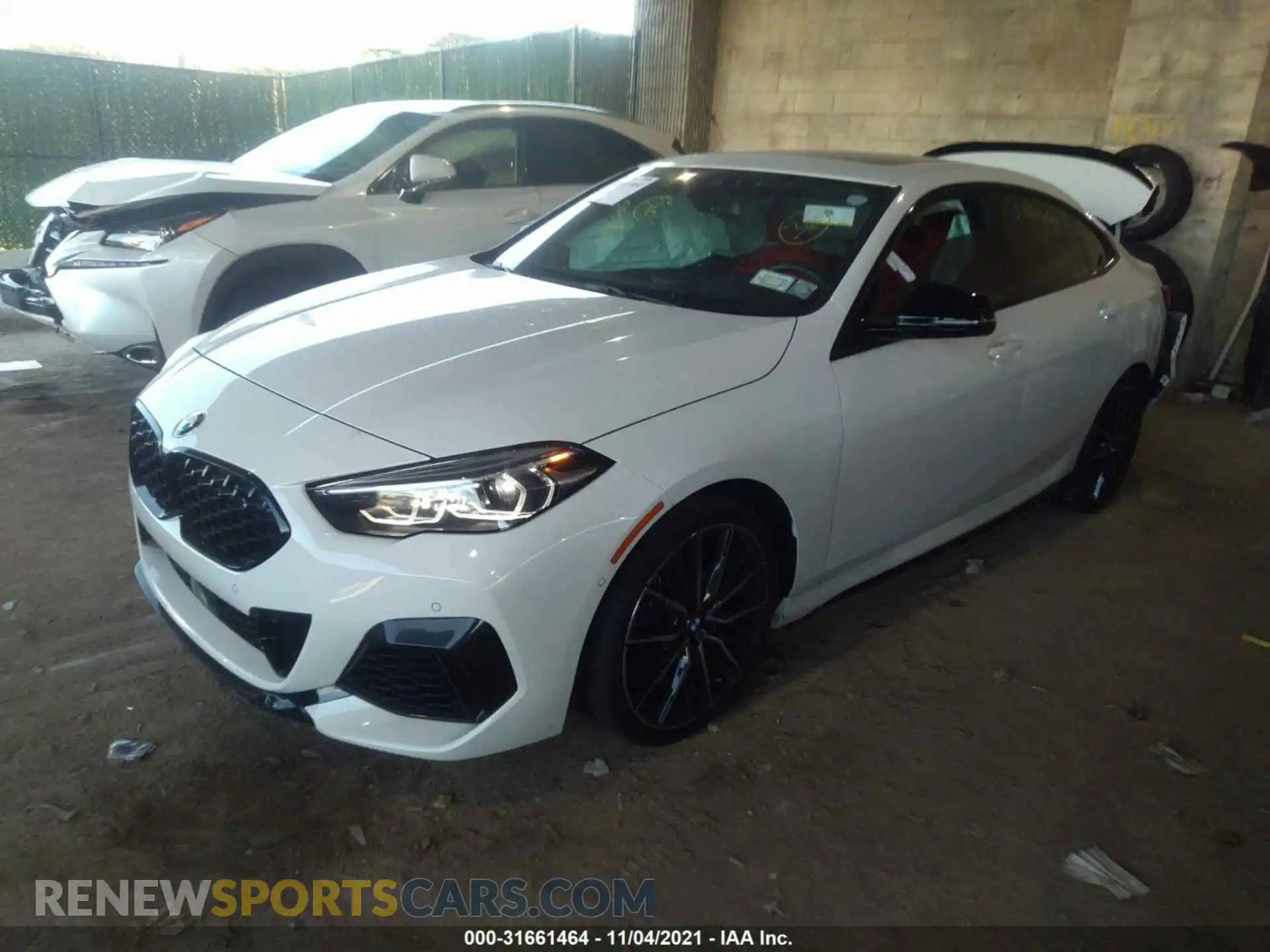2 Photograph of a damaged car WBA13AL01M7G83448 BMW 2 SERIES 2021