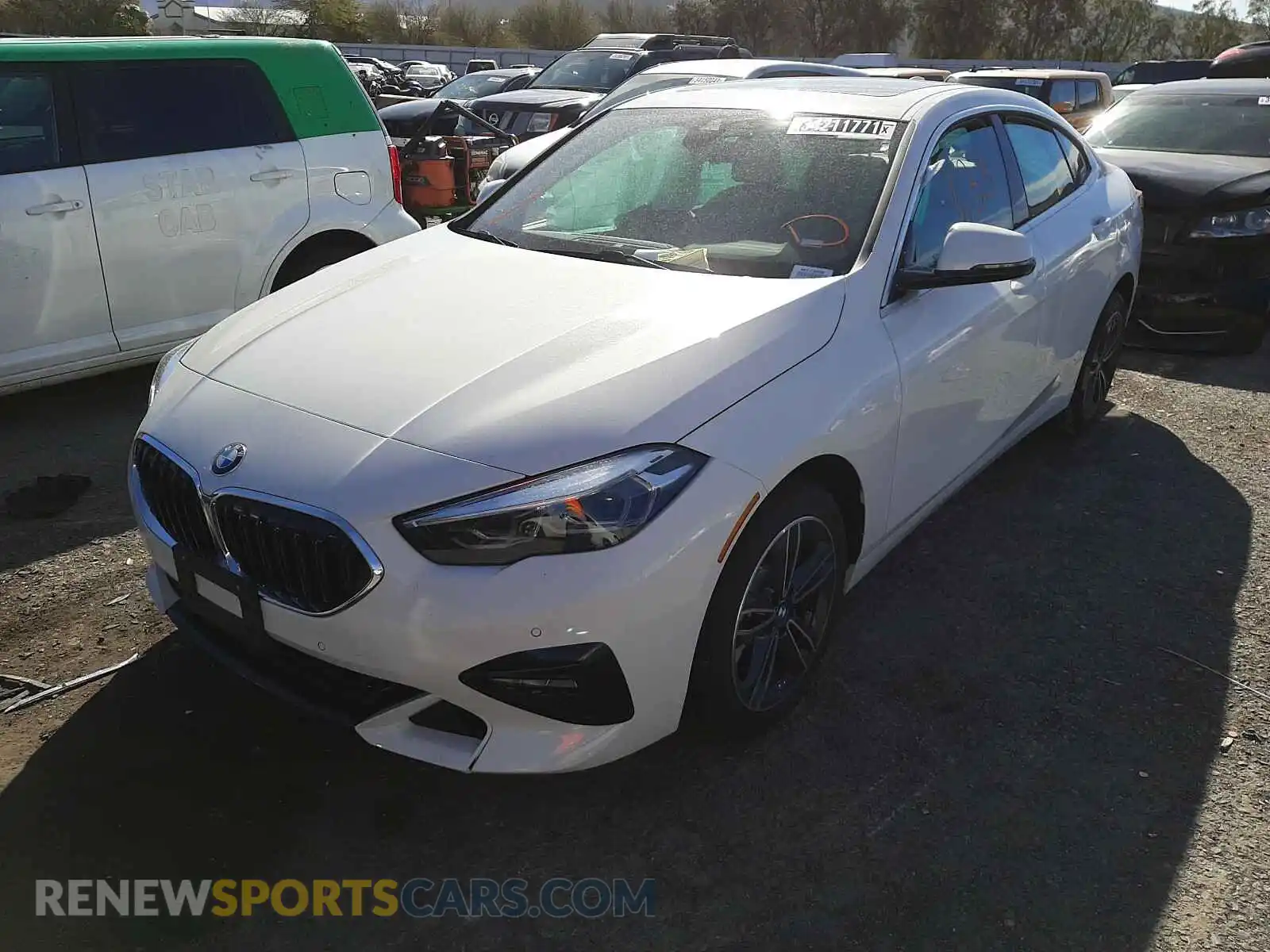 2 Photograph of a damaged car WBA73AK01M7H47290 BMW 2 SERIES 2021