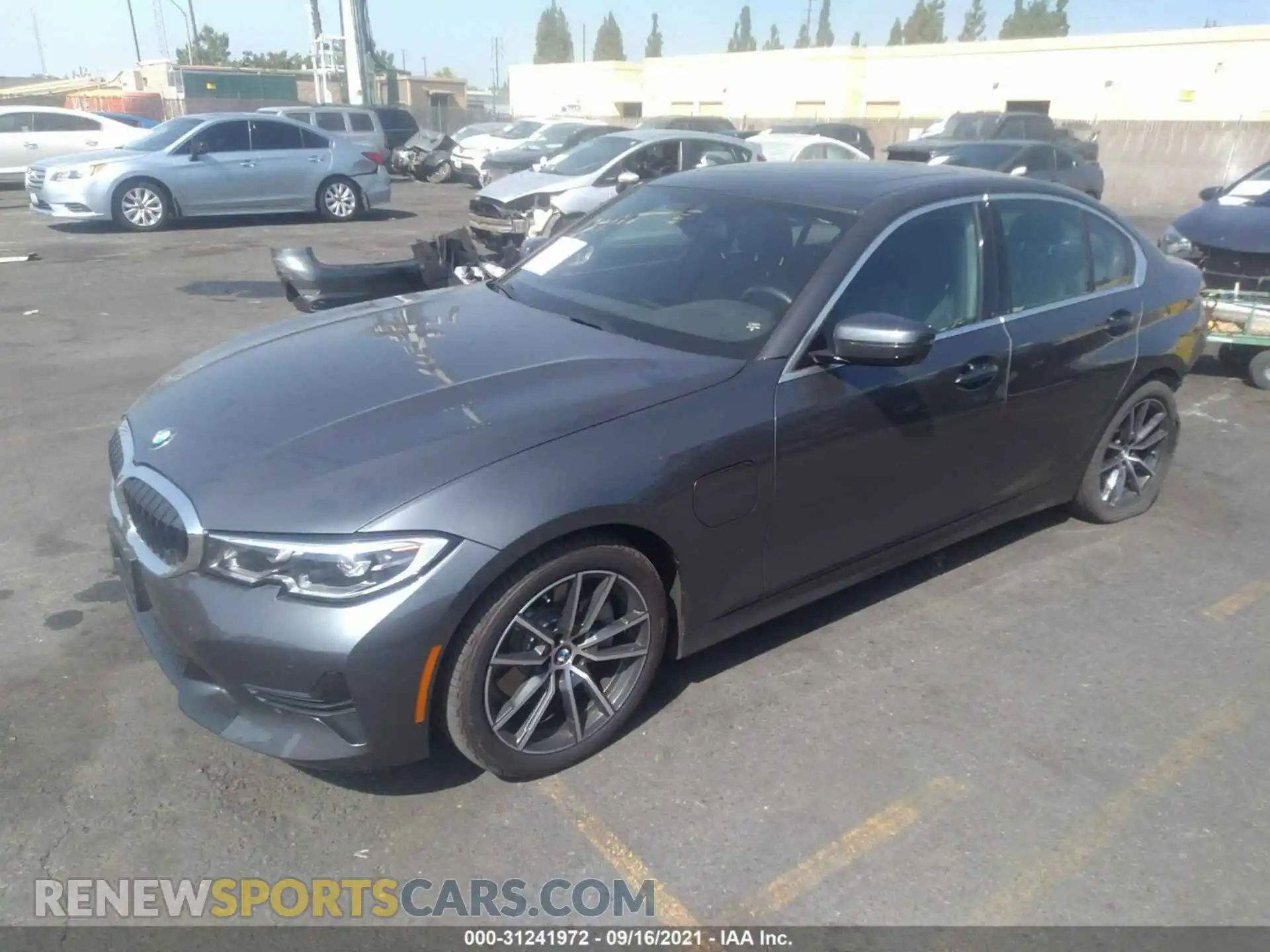 2 Photograph of a damaged car 3MW5P7J07M8C04554 BMW 3 SERIES 2021