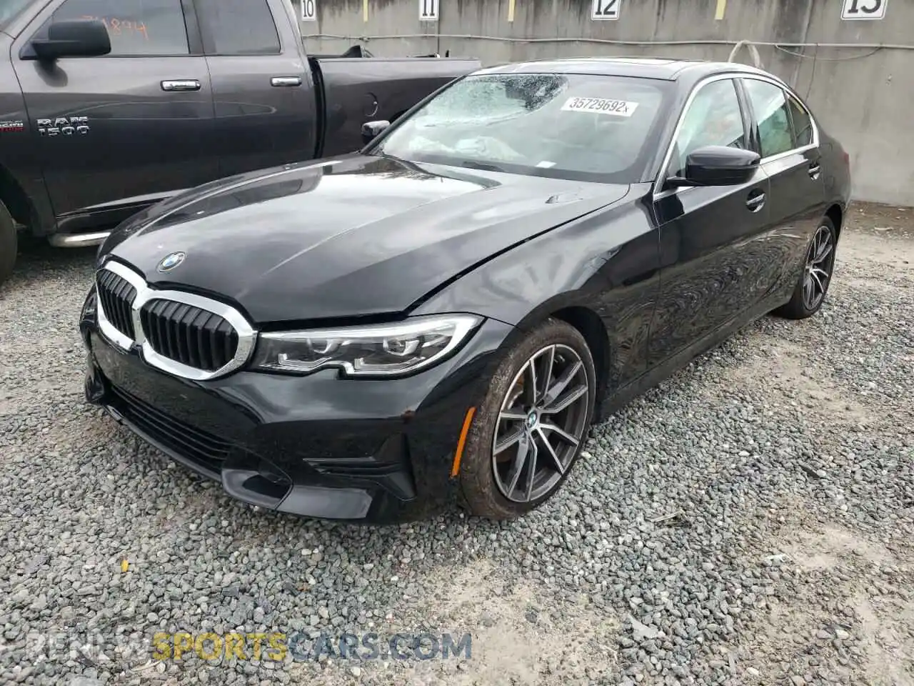 2 Photograph of a damaged car 3MW5R1J0XM8C07715 BMW 3 SERIES 2021