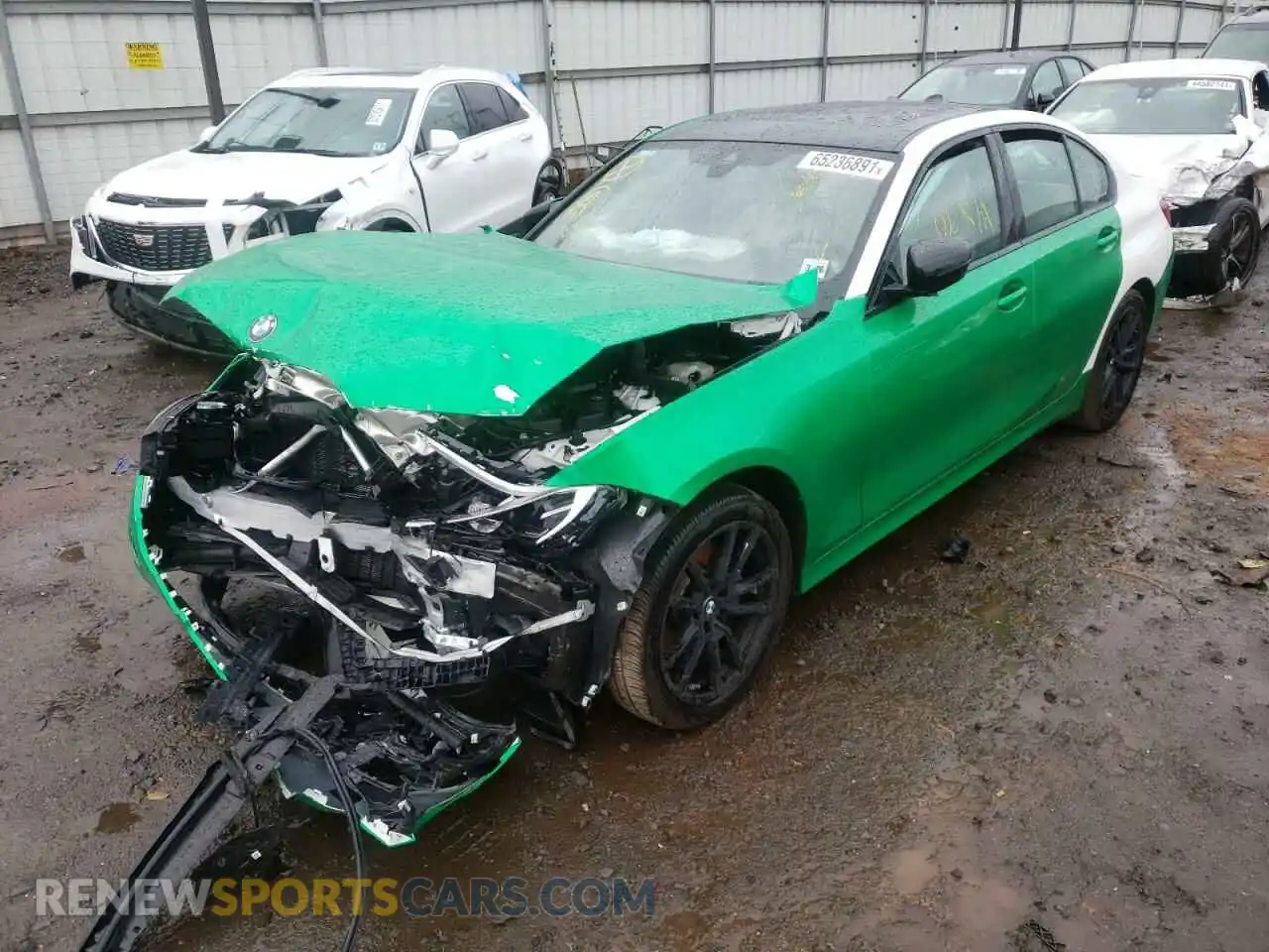 2 fotografías del automóvil dañado 3MW5R7J04M8B49636 BMW 3 SERIES 2021