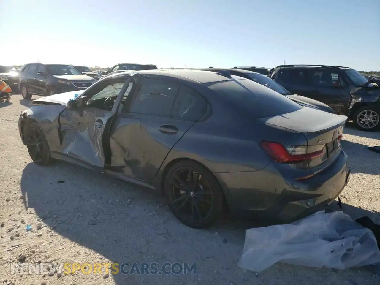 2 Photograph of a damaged car 3MW5R7J0XM8C11301 BMW 3 SERIES 2021