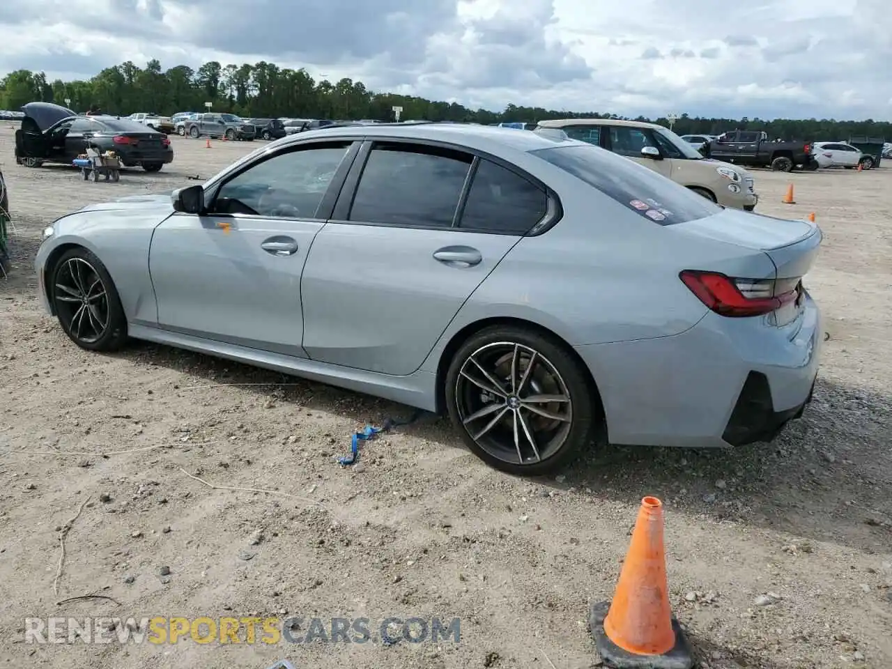 2 Photograph of a damaged car 3MW69FF03P8D04253 BMW 3 SERIES 2023