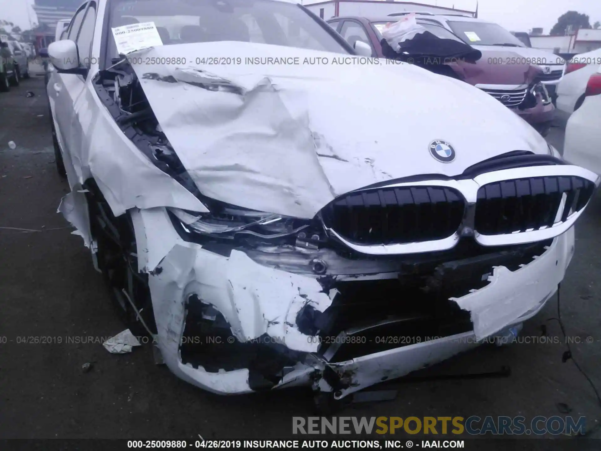 6 Photograph of a damaged car WBA5R1C50KAE81955 BMW 330I 2019