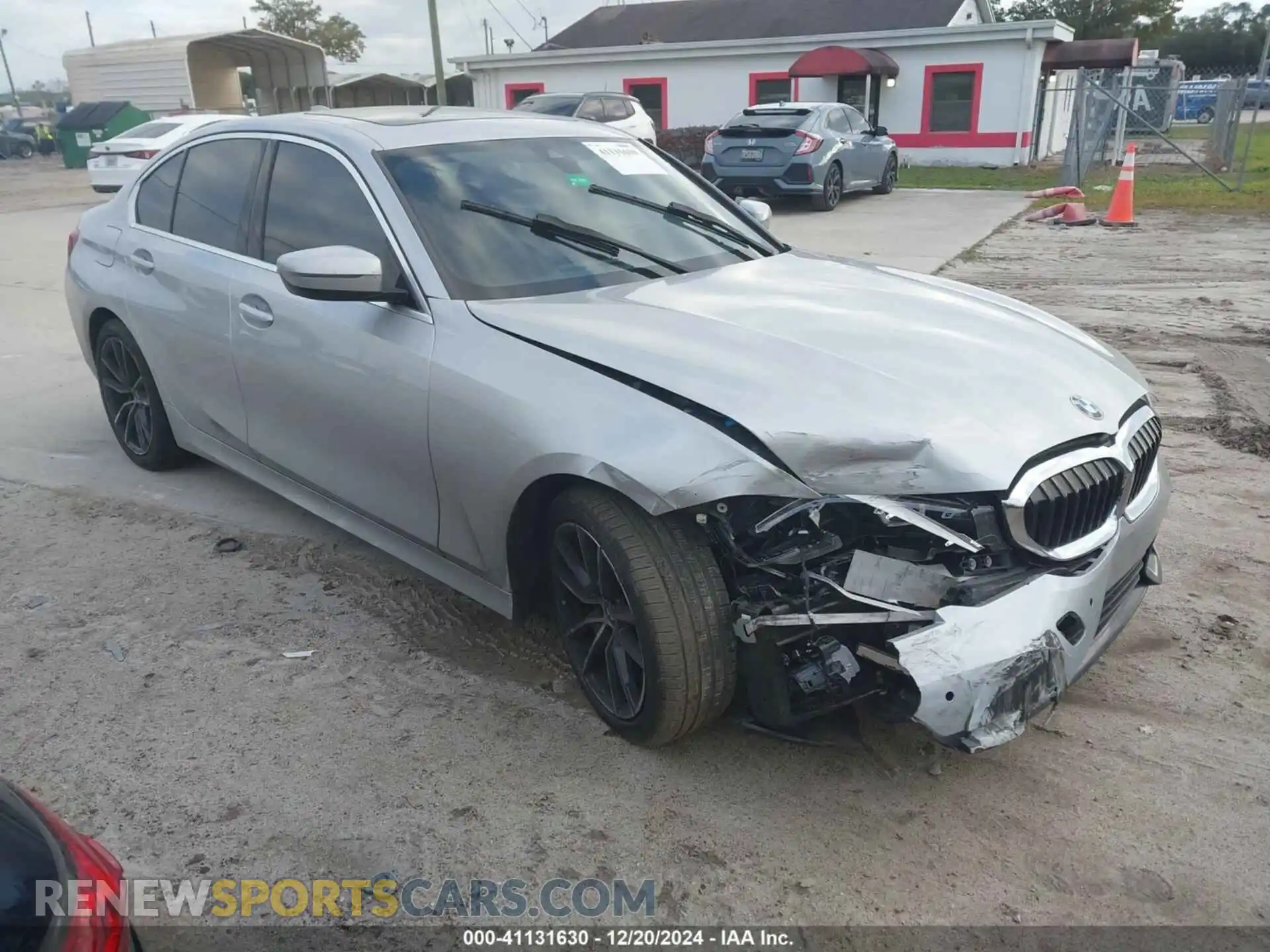 1 Photograph of a damaged car WBA5R1C53KFH11233 BMW 330I 2019