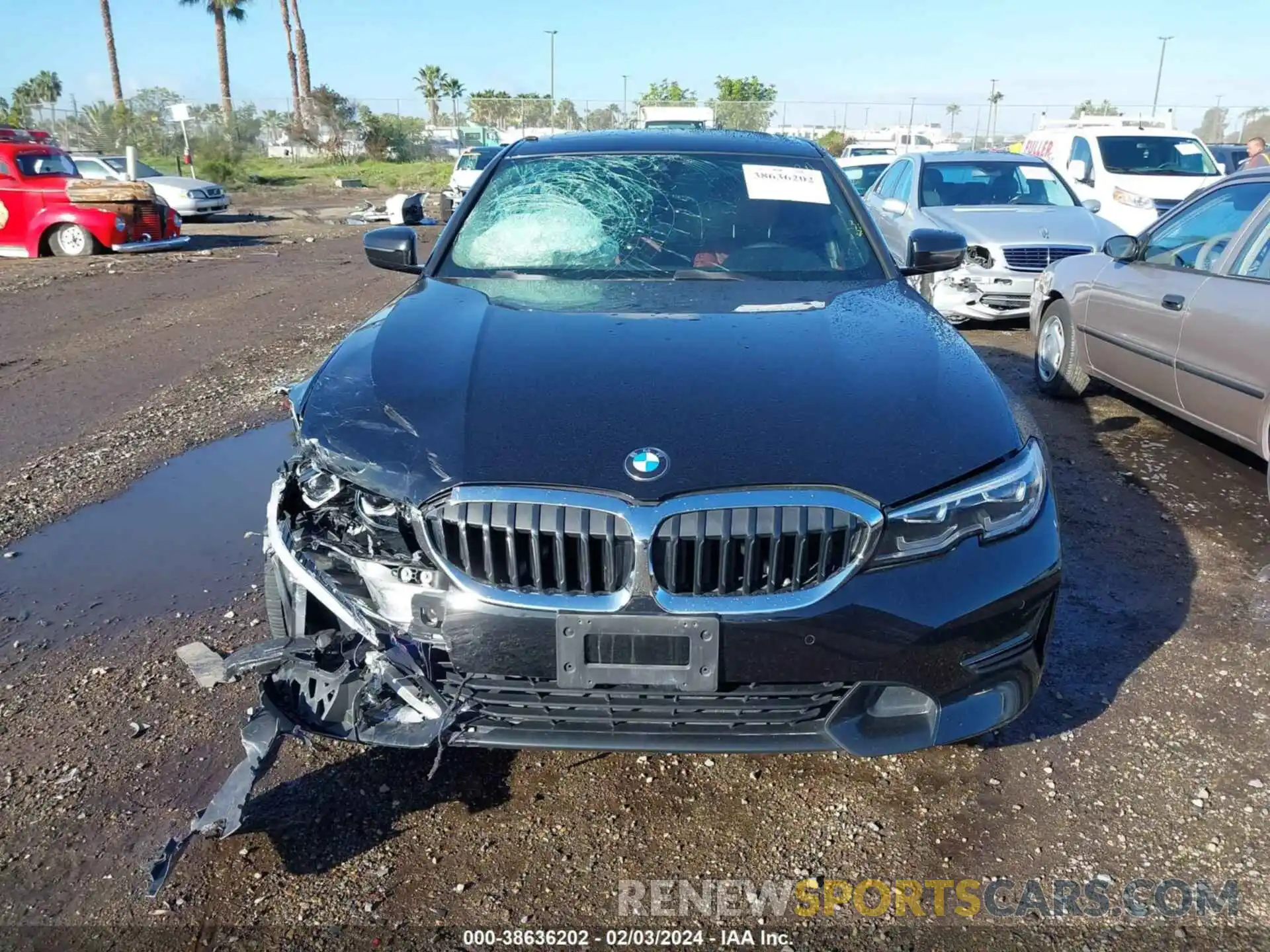 12 Photograph of a damaged car 3MW5R1J06N8C43371 BMW 330I 2022