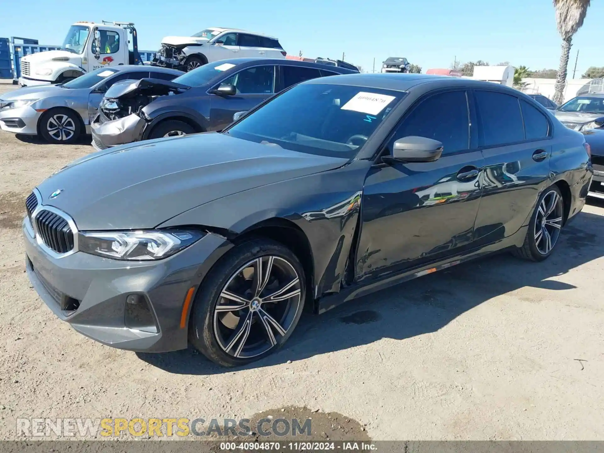 2 Photograph of a damaged car 3MW69FF08P8D47180 BMW 330I 2023