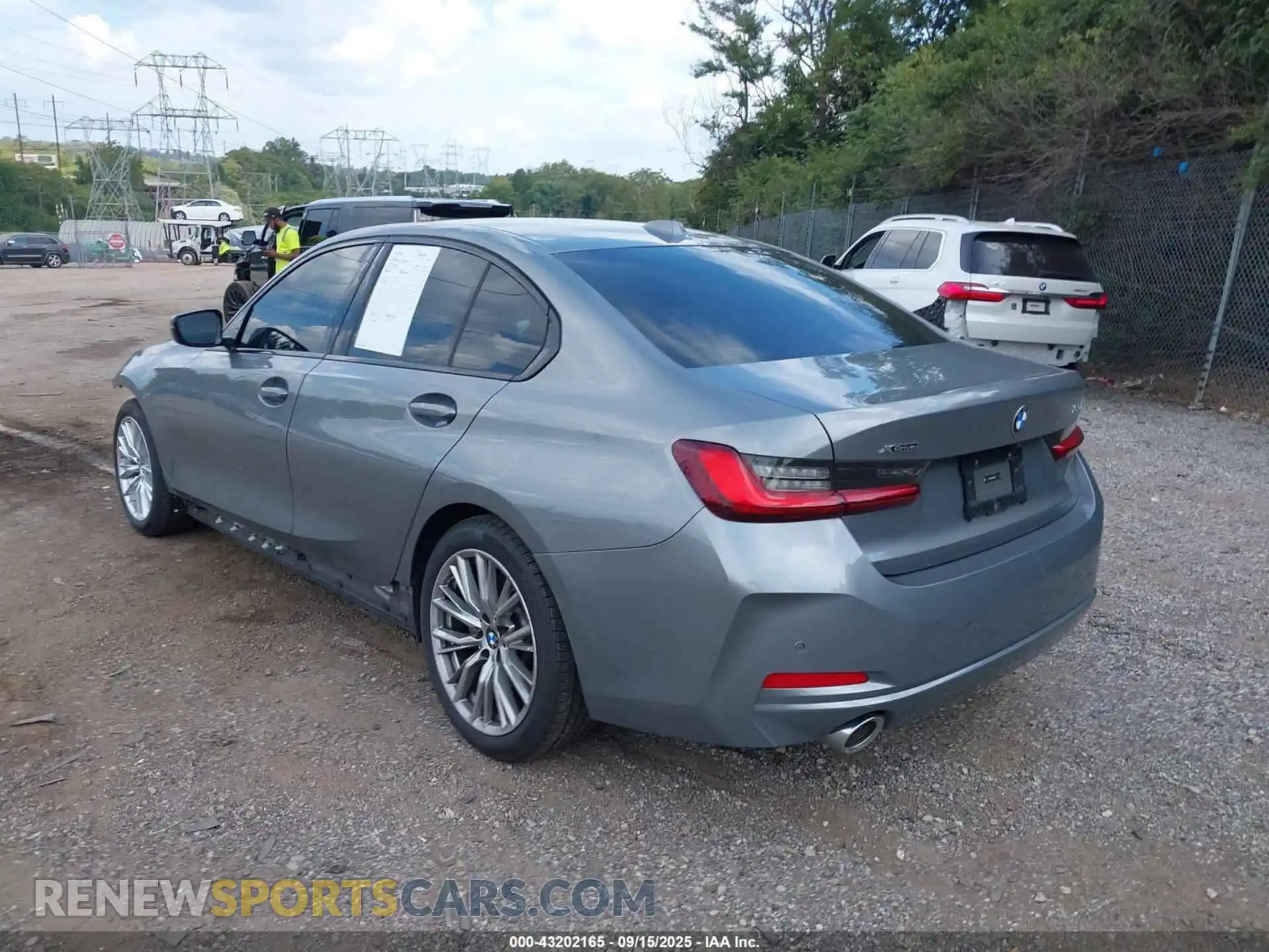 3 Photograph of a damaged car 3MW89FF04P8D49131 BMW 330I 2023