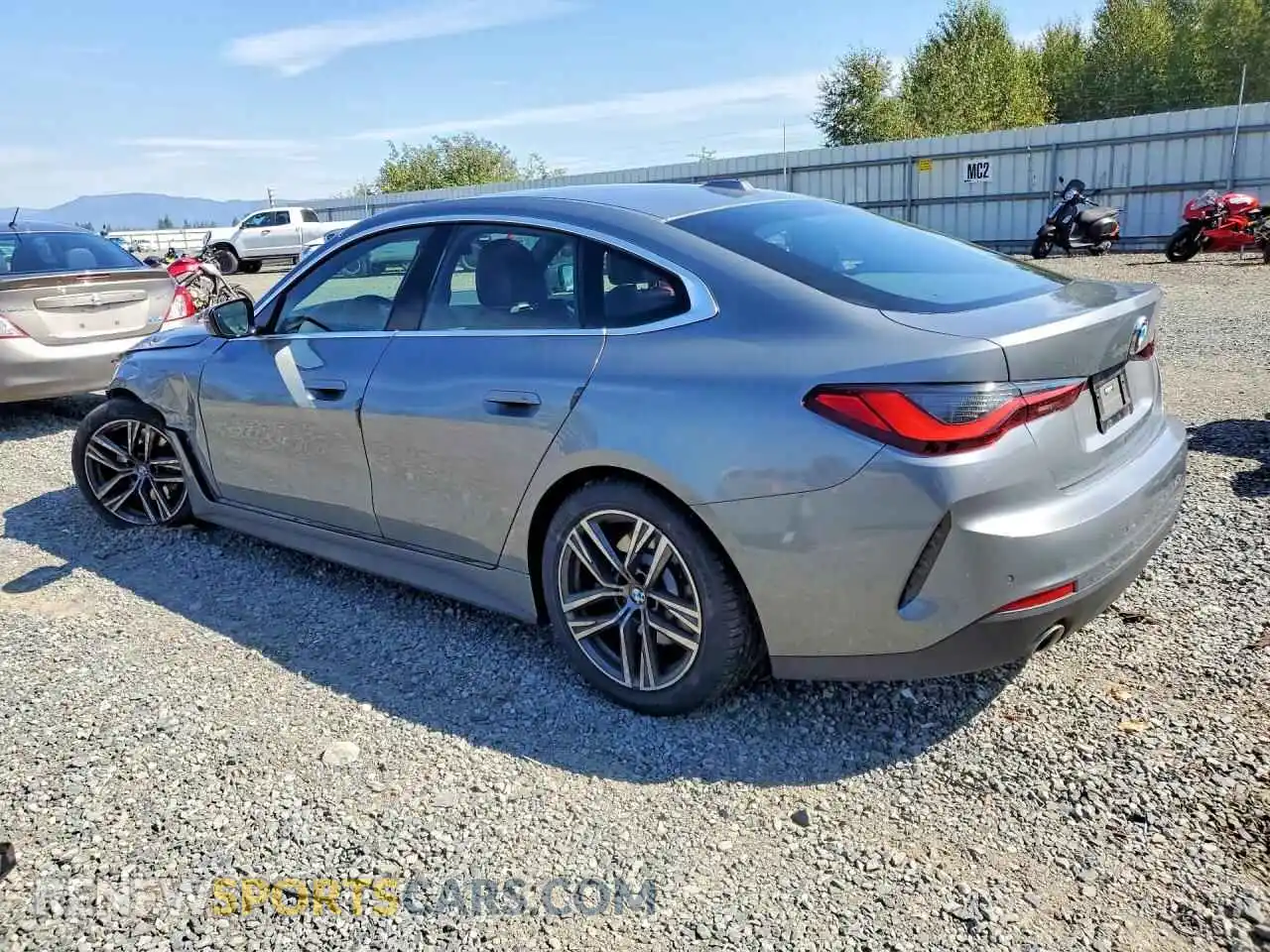 2 fotografías del automóvil dañado WBA63AV07NFM84069 BMW 4 SERIES 2022